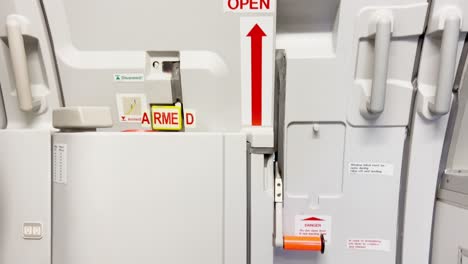 Details-of-Airbus-a320-airplane-aft-door-closed-and-armed-during-flight
