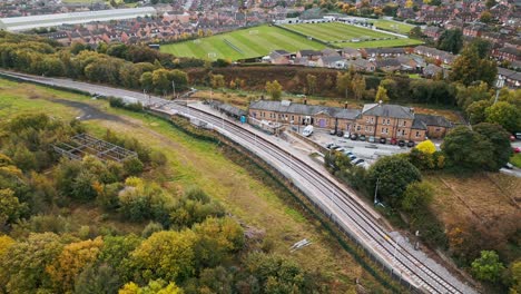 Drone-footage-of-the-Penistone-Railway-Station-and-Viaduct-near-Barnsley,-South-Yorkshire