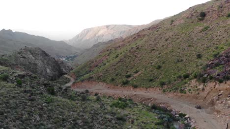 Aerial-View-Of-Remote-Road-Through-Mountainous-Valleys-In-Khuzdar
