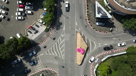Top-down-drone-view-looking-at-busy-intersection-in-South-East-Asia