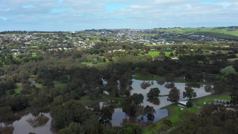 AERIAL-Orbital-Of-Flood-Waters-Of-The-Barwon-River,-Geelong-Australia
