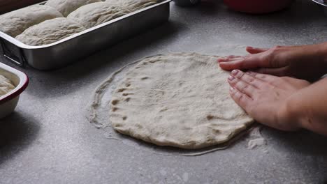 Woman-making-pizza-at-home
