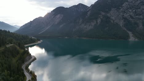 Lake-in-Tyrol-Austria-morning-rising-drone-view