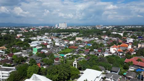 High-above-aerial-drone-flight-over-Suburban-houses-in-South-East-Asia