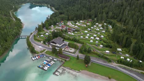 Camping-Seespitze-campsite-Plansee-Austria-drone-aerial-view-pull-back-reveal-shot