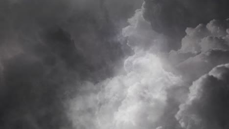 thunderstorm,-thick-dark-clouds-in-the-sky-with-flashes