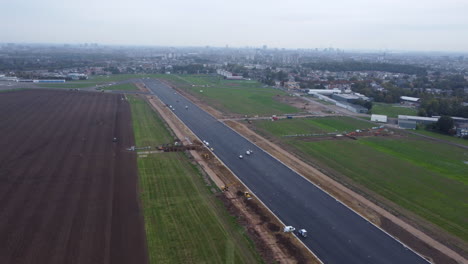 Drone-View-Flying-over-Closed-Runway-of-Antwerp-Airport-during-Works