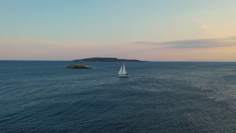 Aerial---Sailing-boat-sailing-in-Vouliagmeni