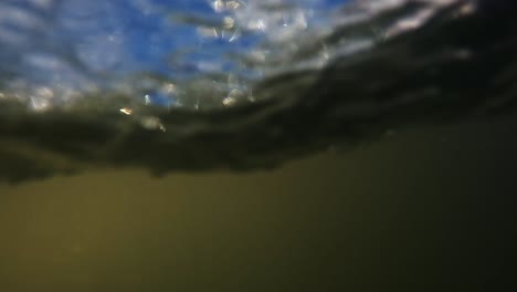 shot-of-splashing-water-from-a-jet-ski-boat-from-side-waverunner
