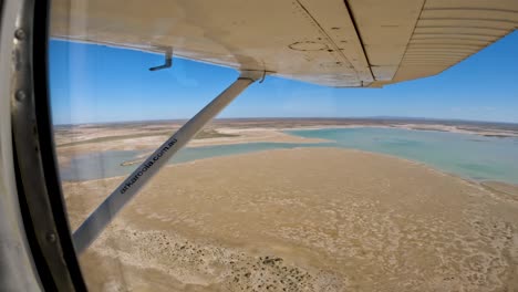 Aerial-view-of-Callabonna-Lake-landscape,-Pov-from-small-touristic-aircraft,-South-Australia