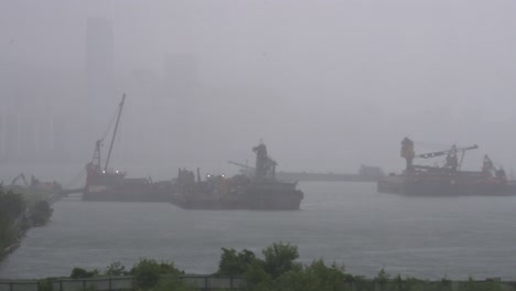 Ships-are-seen-at-the-waterfront-under-heavy-rain-during-a-severe-tropical-typhoon-storm-signal-T8-Ma-On,-which-sustained-winds-of-63-miles-and-damaged-the-city-of-Hong-Kong