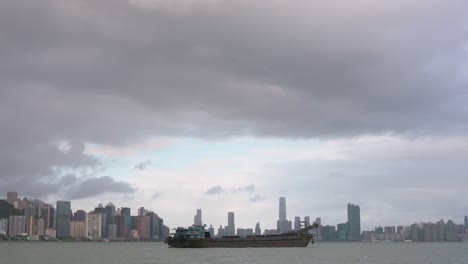 A-ship-is-seen-at-the-waterfront-as-a-severe-tropical-typhoon-storm-gives-a-temporary-break-which-sustained-winds-of-63-miles-and-damaged-the-city-of-Hong-Kong