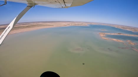 Pov-Small-aricfrat-flyover-Beautiful-Lake-Callabona,-Arkaroola-,-Australia