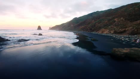Fpv-shot-of-the-beach,-too-close-to-the-ground,-in-the-sun-set-in-Tenerife,-Canary-Island