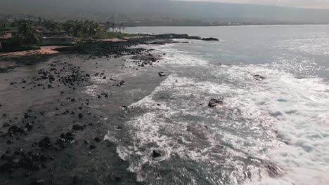 Fast-Aerial-Shot-of-Waves-Crashing-on-Rocks