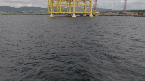 Tilt-up-Reveal-Of-An-Innovative-Offshore-Salmon-Fish-Farming-Facility-In-Trondheim,-Norway
