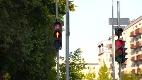 Static-view-of-the-countdown-of-a-red-traffic-light-with-prohibition-to-cross-the-street