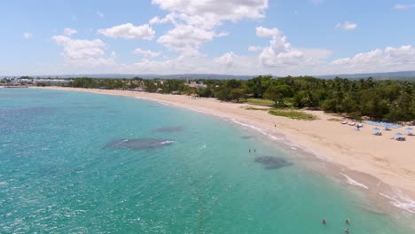 Panoramic-drone-shot-of-beautiful-beach-in-Dominican-Republic