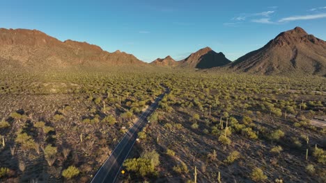 Fly-Over-Empty-Road-In-Desert-Mountains-In-Tucson,-Arizona,-United-States