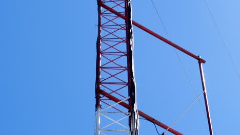 tilt-up-shot-of-tower-transmitter-FM-radio-station
