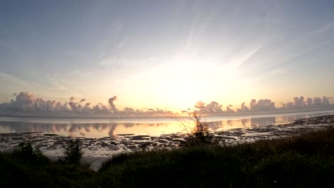Spectacular-time-lapse-of-sunrise-with-a-boat-in-Kiwengwa,-Zanzibar