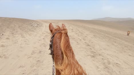 POV-Riding,-Galloping-Chestnut-horse-going-up-a-deserted-trail