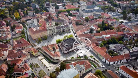 In-Eger,-on-Gárdonyi-Géza-Square,-we-can-see-the-panorama-of-the-historic-city-centre-from-a-height-of-30-metres-on-the-Ferris-wheel-observatory-in-Eger-Town