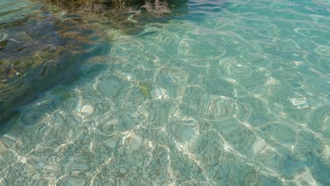 Crystal-clear-turquoise-sea-water,-Bataria-beach,-Corfu,-Greece