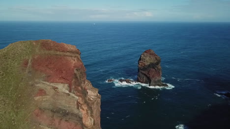 Drone-shot-of-a-stone-in-the-ocean-of-Madeira