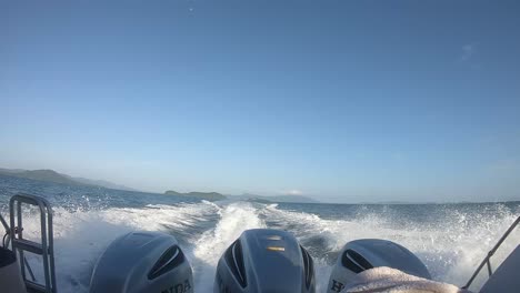 Beautiful-view-from-the-running-boat,-the-wave-of-powerful-engine-cuts-through-the-smooth-surface-of-the-sea-water