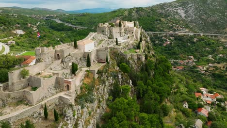 Aerial-approach-of-the-fortress-Klis-in-Split,-Croatia
