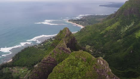 Dramatic-aerial-footage-of-pink-sunset-at-famous-Haena-park,-and-Kalalau-trail-by-NaPali-coast