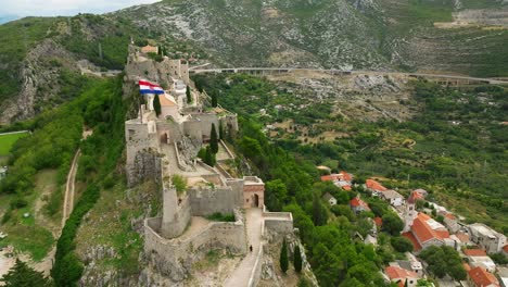 Aerial-side-view-of-the-fortress-at-Klis-in-Split,-Croatia