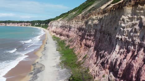 Colorful-Cliffside-Brazilian-Beach-in-the-North-East-Desert-during-High-Tide
