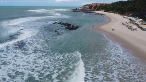 Pan-Along-Brazilian-Beach-in-Agua-Blue-Water-And-Cliffside-beaches-White-Sand