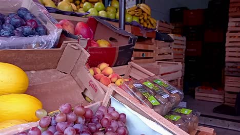 Healthy-fruit-market-with-all-kinds-of-fruits-like,-grapes,-peaches,nectarines,pears,mangos,melons