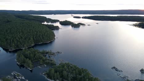 Aerial-shot-of-Swedish-islands,-landscape-with-forest-and-big-lakes,-4k