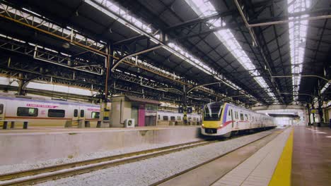 Wide-shot-train-arrives-at-Kuala-Lumpur-train-station
