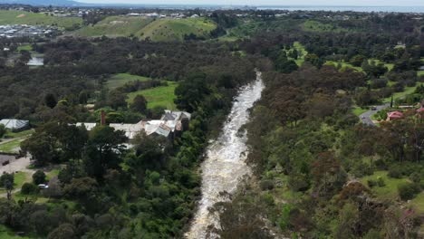 AERIAL-Rapidly-Flowing-River-After-Deluge-Of-Heavy-Rainfall