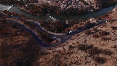 A-drone-shot-uncovering-the-city-of-Toledo,-Spain,-a-fortified-European-city