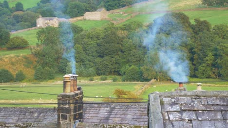 Yorkshire-cottage-smoking-chimney-stacks-in-rural-setting-1