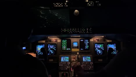 Awesome-night-view-of-a-jet-cockpit-during-a-left-turn-toward-Palma-de-Mallorca-Airport