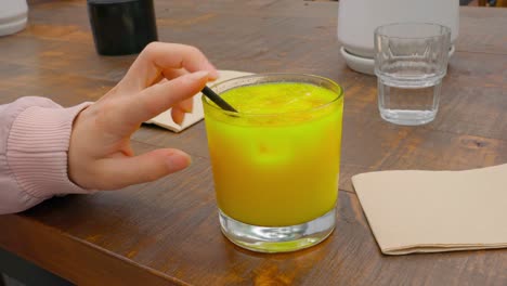 playing-with-straws-for-orange-juice