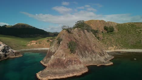Aerial-shot-of-clifftop-reveal-in-NZ's-Coromandel-Region