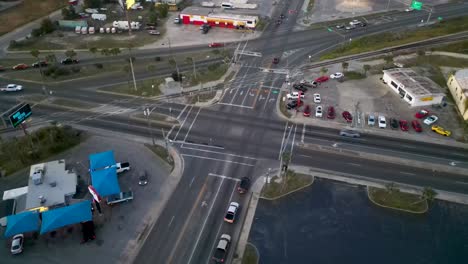 drone-view-circling-the-intersection-of-Harrison-ave,-us-hwy-231,-us-hwy-98-and-railroad-in-Panama-City-FL