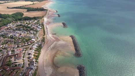 Elmer-Sands-Beach-Con-Aguas-Turquesas-En-West-Sussex,-Reino-Unido---Toma-Aérea-De-Drones