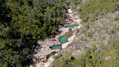 Aerial-footage-from-aqua-toned-rock-pools-in-Queensland-Hinterland