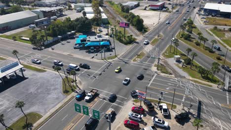 hyperlapse-drone-view-circling-the-intersection-of-Harrison-ave,-us-hwy-231,-us-hwy-98-and-railroad-in-Panama-City-FL