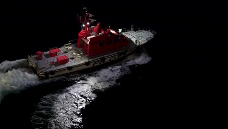 Pilot-Boat-pulls-away-from-the-ship-and-turns-off-searchlights