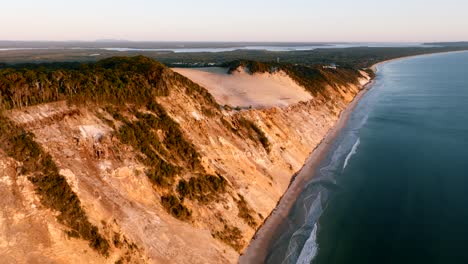 Slow-side-pan-during-an-early-morning-flight-around-Rainbow-Beach-in-Queensland